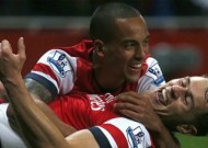 Premier League - Arsenal condemn Wigan to relegation