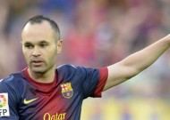 Iniesta signs on the dotted line