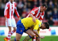 Adam charged by FA over Giroud clash