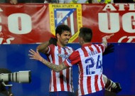 Atletico book passage with Milan humbling