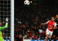 Sanchez first goal helps Gunners qualify