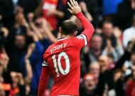 Rooney sorry over "reckless lunge"
