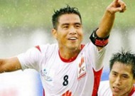 National striker Thang retires