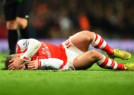 Wilshere has ligament damage, admits Wenger