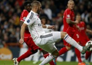 Real down Liverpool 1-0 to reach knockout round