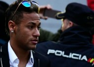 King of bling Neymar untarnished by transfer scandal