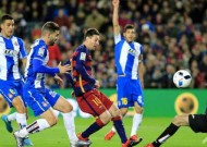 Messi double eases Barcelona past nine-man Espanyol