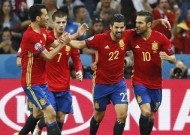 Spain cruise to last 16 after crucial win over Turkey