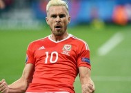 Wales advance to last 16 as Group B leaders