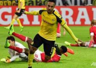 Aubameyang's hat-trick fires Dortmund into quarters