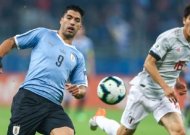 Suarez scores but Copa guests Japan earn draw